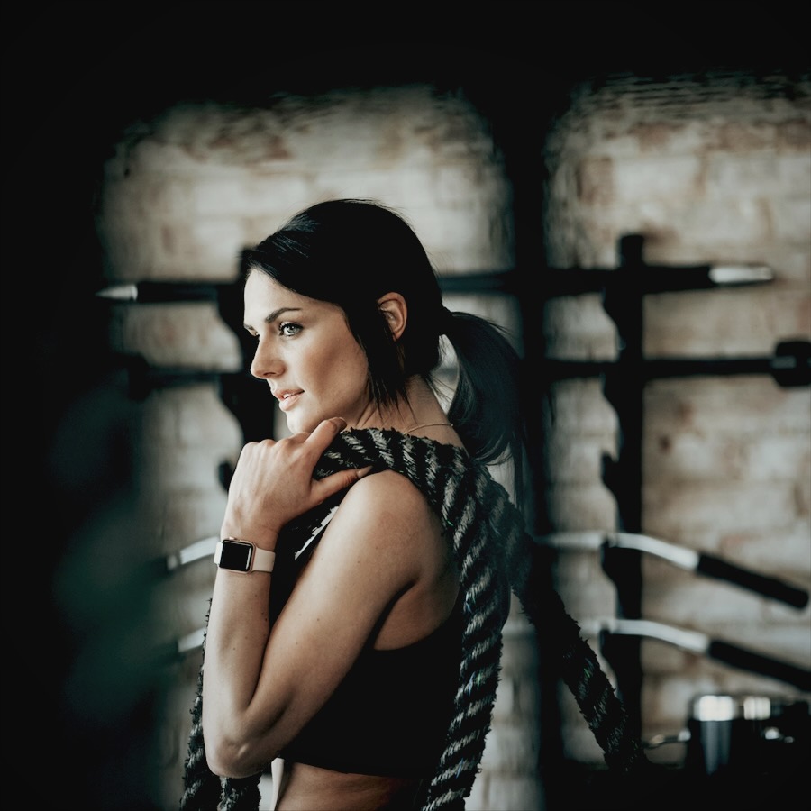 Athlete resting with a battle rope